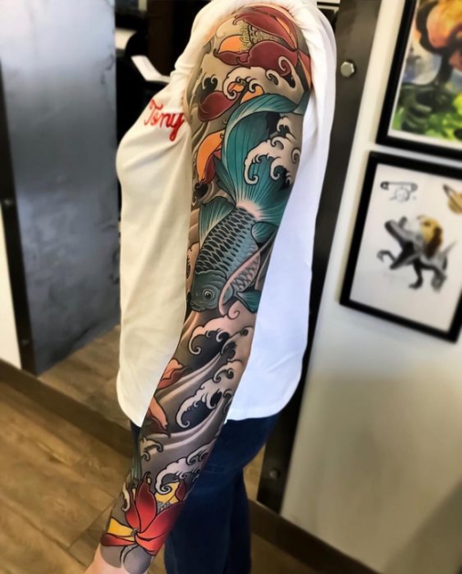 Hình xăm tattoo cá chép nhiều màu sắc full ở cánh tay đẹp ý nghĩa nhất